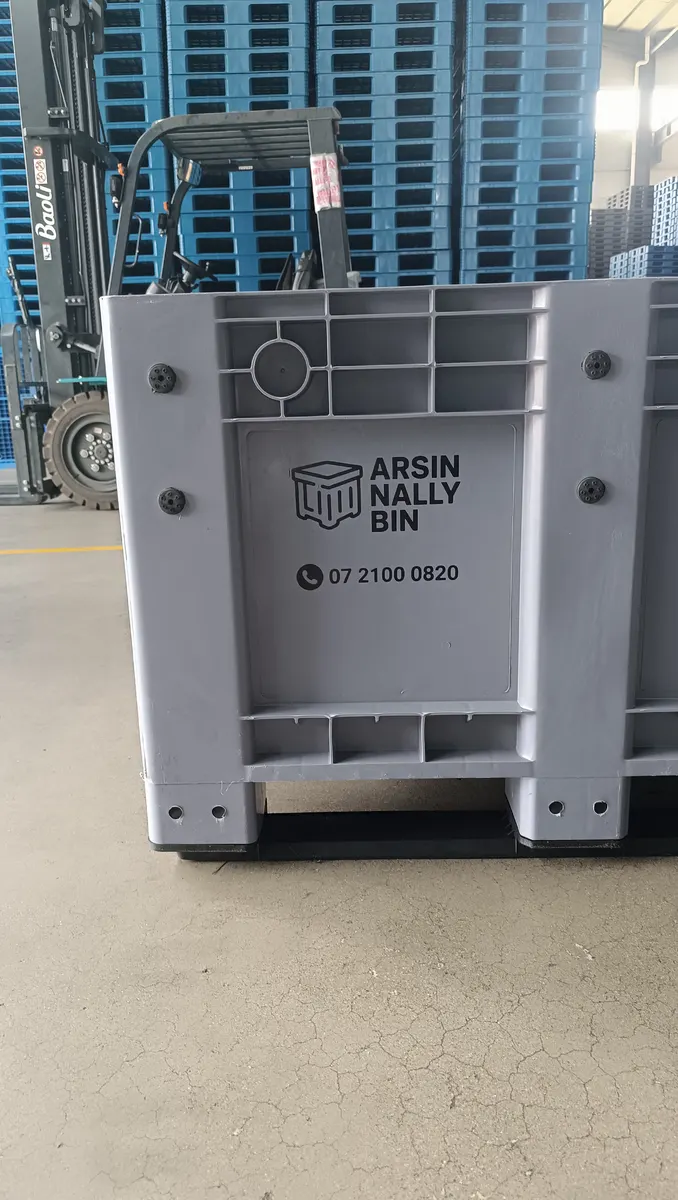 Plastic pallet boxes stacked in the warehouse